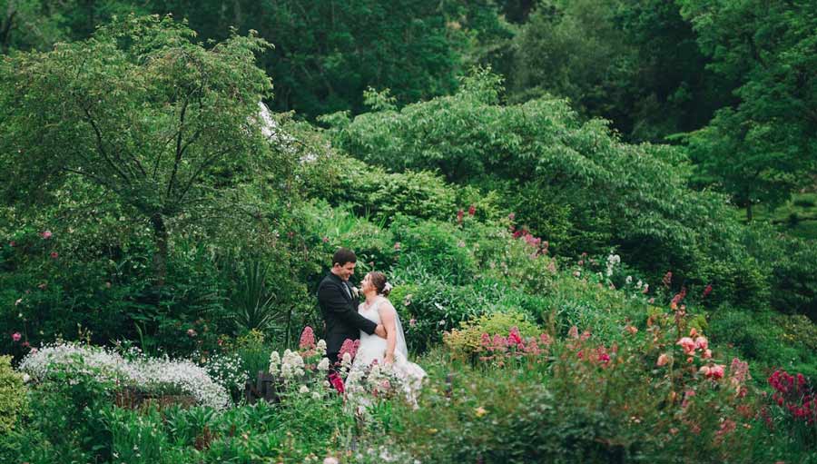 Bride & Groom in garden wedding Nelson at Fairfield House